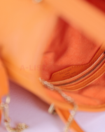 Louis Vuitton Petit Bucket Bag in Orange