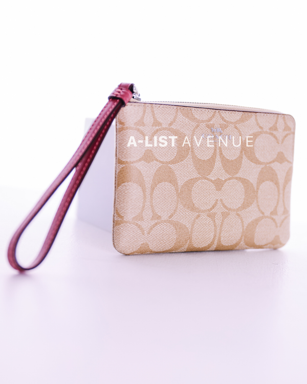 Coach Corner Zip Wristlet Pink Strap